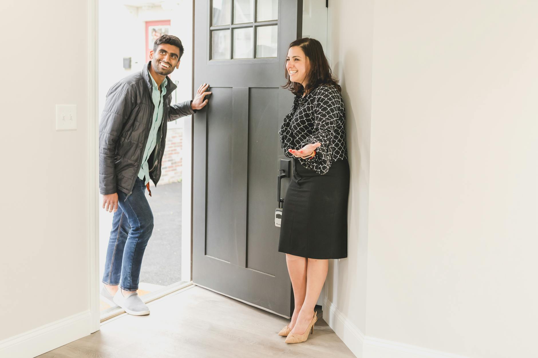 real estate agent showing the unit to her client