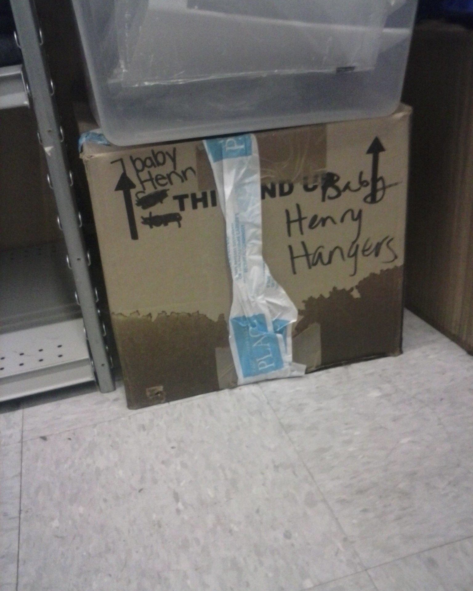 A cardboard box that is soaking wet from a flooded stock room at the vancouver Mall