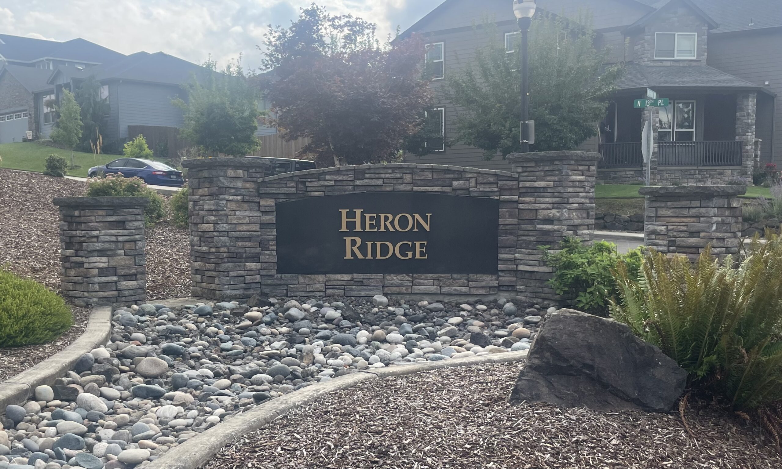 A neighborhood sign in Ridgefield Washington to the Heron Ridge Neighborhood