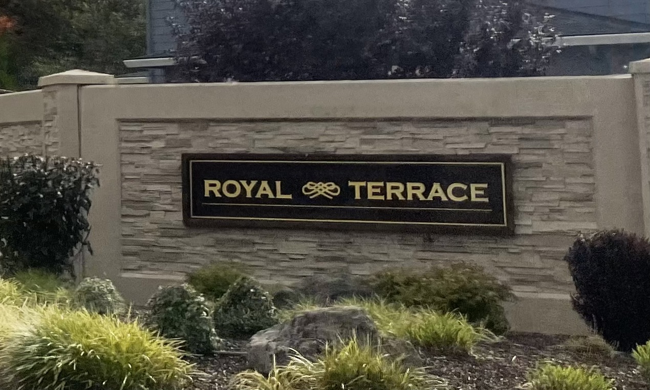 Sign with the words Royal Terrace for a neighborhood in Ridgefield Washington, where BenchMark Restoration provides Cleaning (like carpet cleaning) and Water Damage Restoration Services