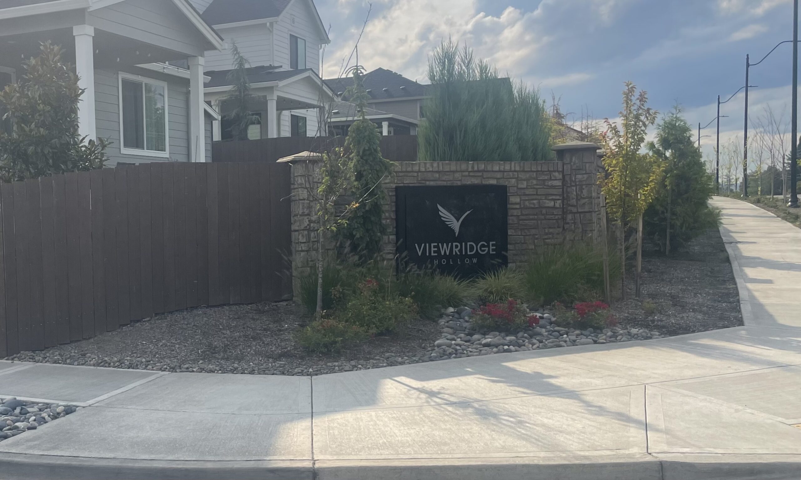 Viewridge Hollow neighborhood sign made out of decorative stone and metal