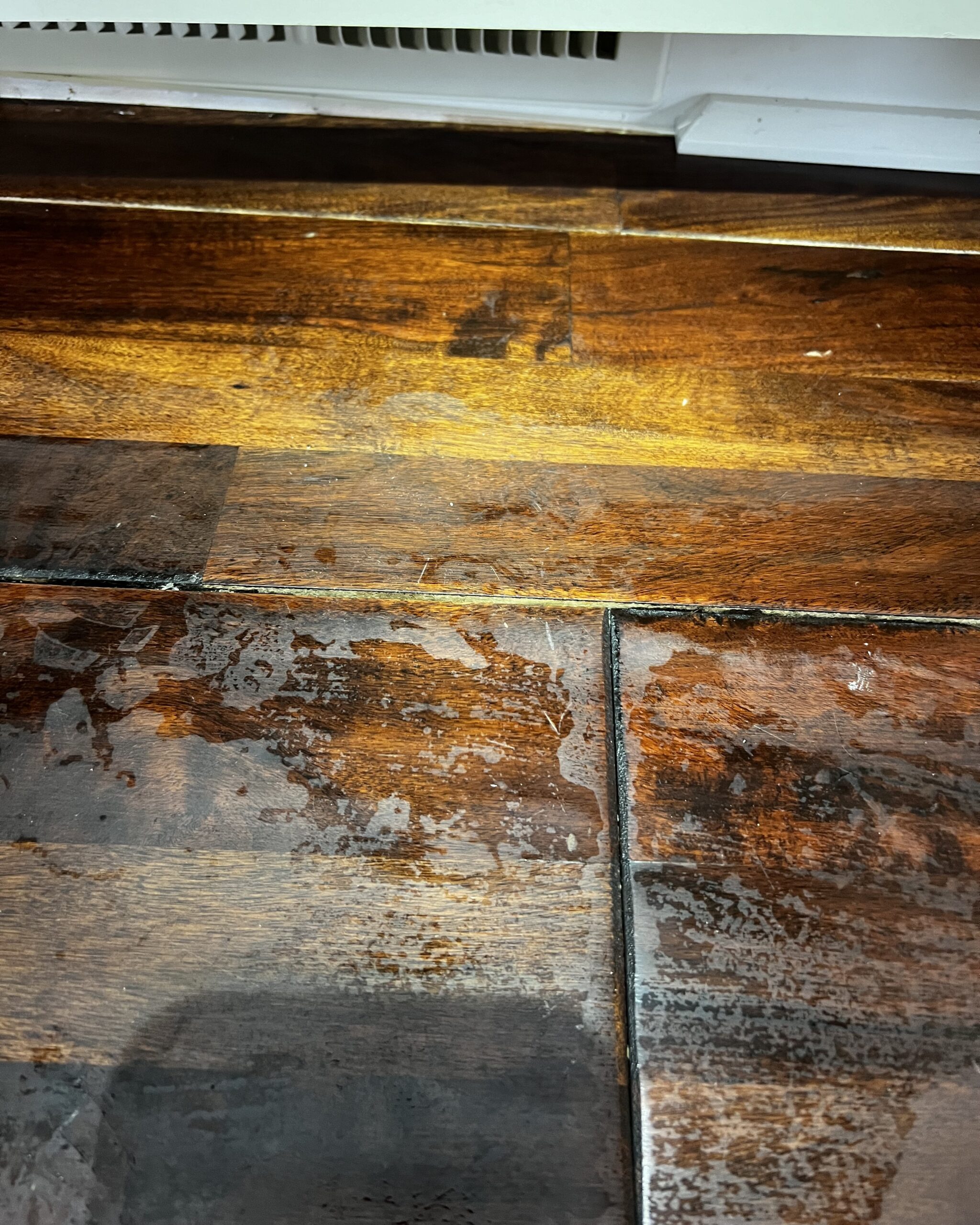 Hardwood floors with water covering them from a water damage at 31020 NW 51st Ave, Ridgefield WA 98642